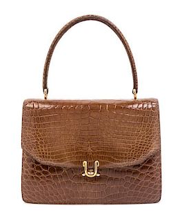 A Gucci Brown Alligator Top Handle Handbag,
