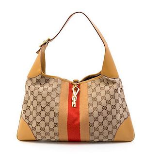 A Gucci Brown Monogram Canvas Shoulder Bag,