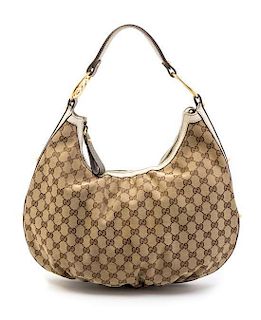 A Gucci Brown Monogram Canvas Shoulder Bag,