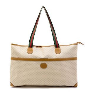 * A Gucci Monogram Handbag, 14.5" x 20".