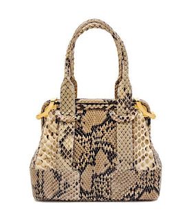 A Judith Leiber Snakeskin Handbag, 5.2" x 3" x 2.5".