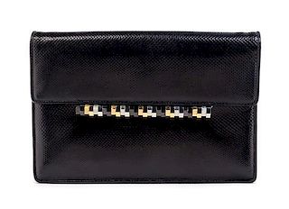 * A Judith Leiber Black Reptile Leather Clutch, 10 x 7 inches.