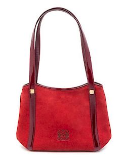 * A Loewe Red Suede Handbag, 9" x 6" x 2.5".
