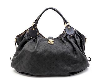 A Louis Vuitton Black Perforated Mahina Handbag, 16" x 17" x 8".