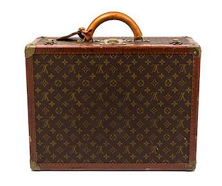 * A Louis Vuitton Hardsided Suitcase, 20" x 14.5" x 6.5".