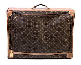 A Louis Vuitton Suitcase, 28" x 22' x 9".