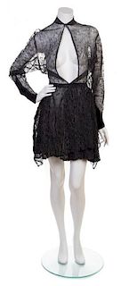 * An Alaia Black Net Dress, Size 40.