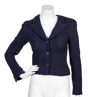 * A Chanel Black and Blue Tweed Jacket, Size 36.
