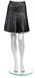 * A Chanel Black Leather Pleated Skirt, Size 34.