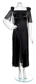 * A Chanel Black Silk Dress, Size 38.