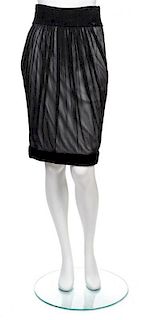 A Chanel Black Silk Pleated Skirt, Size 38.