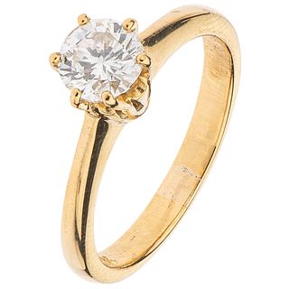 SOLITAIRE RING WITH DIAMOND IN 18K YELLOW GOLD Weight: 3.5 g. Size: 5 ½   1 Brilliant cut diamond ~0.56 ct ...