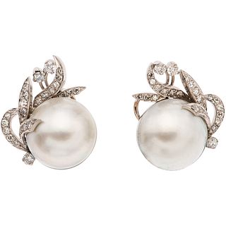 PAIR OF EARRINGS WITH HALF PEARLS AND DIAMONDS IN 12K WHITE GOLD Weight: 16.0 g. Size: 0.86 x 0.98" (2.2 x 2.5 cm)