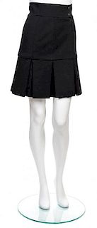 * A Chanel Black Wool Pleated Skirt, Size 36.