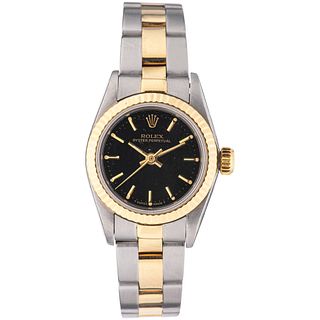 ROLEX OYSTER PERPETUAL LADY WATCH IN STEEL AND 18K YELLOW GOLD REF. 67193, CA. 1991 Movement: automatic. Caliber:...