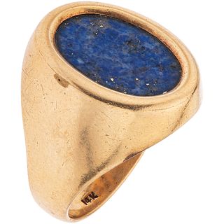 RING WITH LAPIS LAZULI IN 12K YELLOW GOLD Weight: 15.5 g. Size: 10 ½ 1 Lapis Lazuli application: 11.0 x 16.2 mm