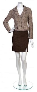 * A Chanel Brown Tweed Boucle Jacket, Size 36.