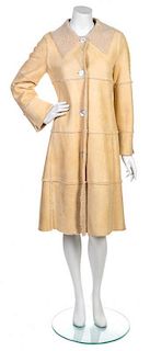 * A Chanel Butterscotch Lambskin Shearling Coat, Size 36.