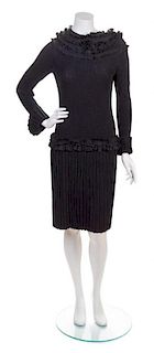 * A Louis Vuitton Black Knit Dress, Size large.