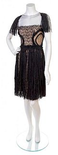 * A Marchesa Black Sequin Dress, Size 4.