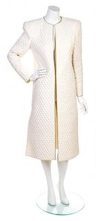 A Mary McFadden Ivory Quilted Coat, Size 8.