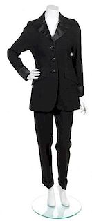 A Romeo Gigli Black Wool Tuxedo Suit, Size 40.