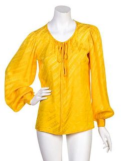 An Yves Saint Laurent Goldenrod Silk Blouse, Size 38.