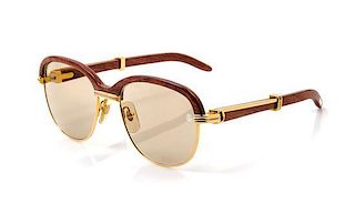 * A Pair of Cartier Goldtone Sunglasses,