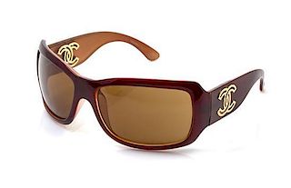 A Pair of Chanel Brown Rectangular Sunglasses,