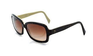 A Pair of Chanel Brown Tortoiseshell Sunglasses,