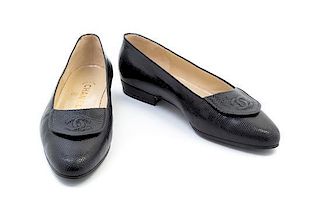 A Pair of Chanel Black Embossed Lizard Loafers, Size 6.5.