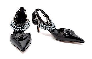 A Pair of Chanel Black Patent Camellia Slingbacks, Size 36.5.