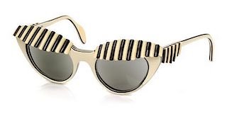 A Pair of Schiaparelli Cabana Awning Sunglasses,