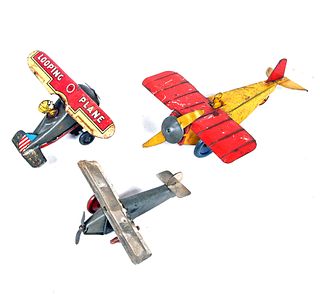 Three Toy Airplanes
