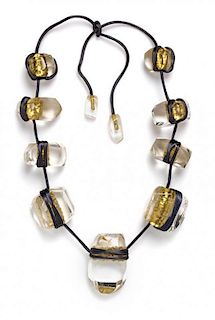 * A Christine McCarthy Clear and Metallic Gold Necklace,