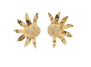 * A Pair of Yves Saint Laurent Gold Sunburst Earclips, 2.5 x 1.5 inches.