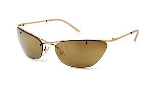 * A Pair of Christian Dior Gold Cat Eye Sunglasses,