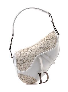 * A Christian Dior White Lace and Leather Saddle Handbag,