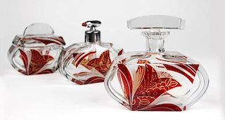 An Art Deco ruby & clear glass vanity set