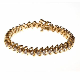 Diamond and 14k gold tennis bracelet