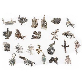 Collection of 23 silver charms