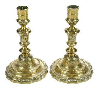 Two Similar Louis XVI Brass Candlesticks