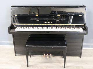 Yamaha Black Lacquered Upright Piano And Bench.