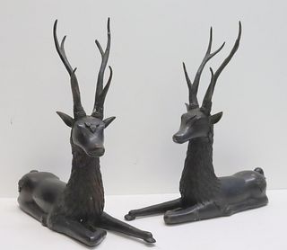 Pair of Patinated Bronze Resting Deer