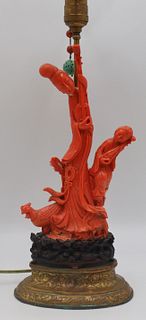 Carved Salmon Coral Figural Grouping.