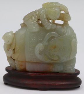 Carved Russet Jade Elephant with Children.