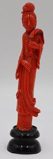 Carved Salmon Coral Figure of a Guan Yin.