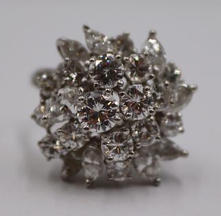JEWELRY. Platinum and Diamond Cluster Ring.