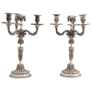 PAIR OF CANDLESTICKS FRANCE, 20TH CENTURY Silver bronze, for three lights each, adaptable to a single light, 15.7" (40 cm) high