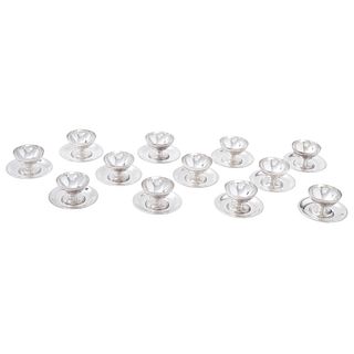 SET OF 12 DESSERT CUPS AND BASE PLATES, SPAIN, 20TH CENTURY Made in silver metal, Meneses, Smooth design, Pieces: 24